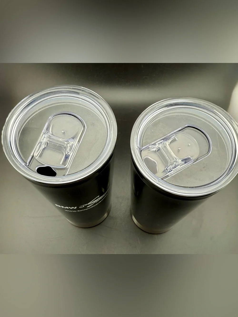 2 New BMW of Sarasota drink tumblers with sealed lids. 22oz